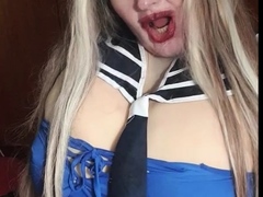 Susi is wearing a sailor outfit sucking giving a toy blowjob