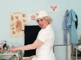 Dirty Mamma in caretaker uniform shows big breasts